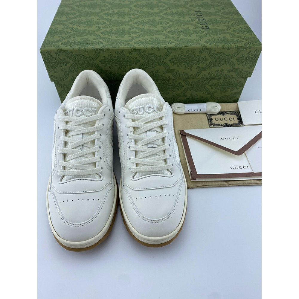 G*u*i1 sneakers